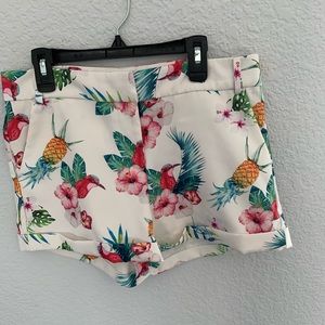 shorts with a tropical pattern